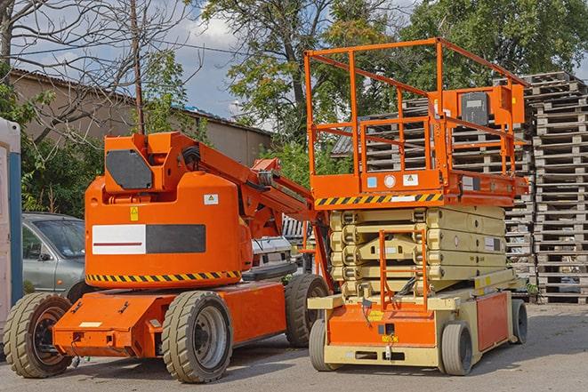 forklift transporting goods in a busy warehouse setting in Cerritos